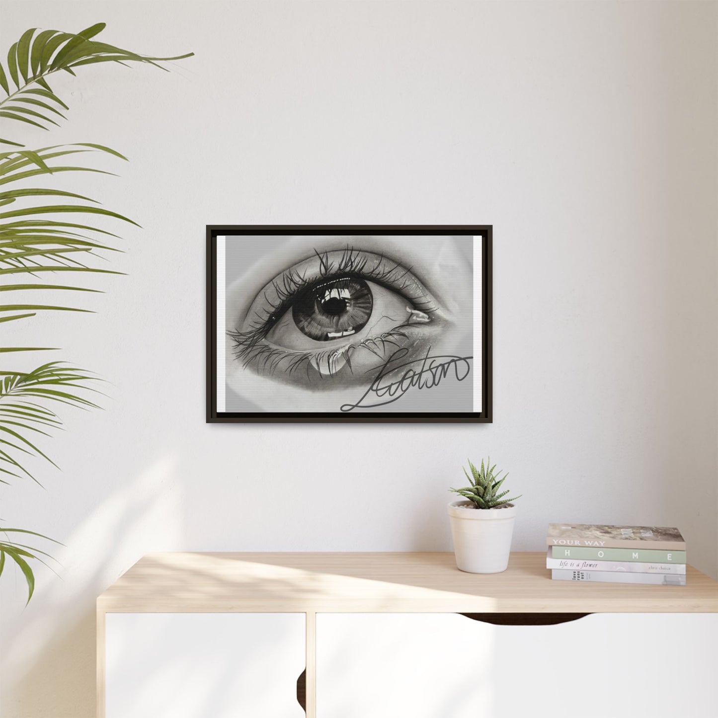 Gerahmte Leinwandkunst – Realistisches Auge mit tränenförmiger Signatur
