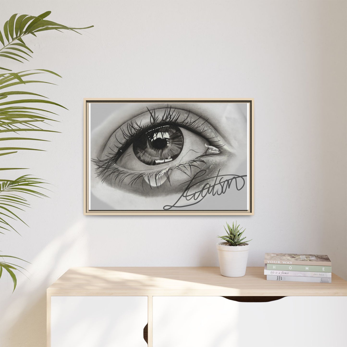 Gerahmte Leinwandkunst – Realistisches Auge mit tränenförmiger Signatur