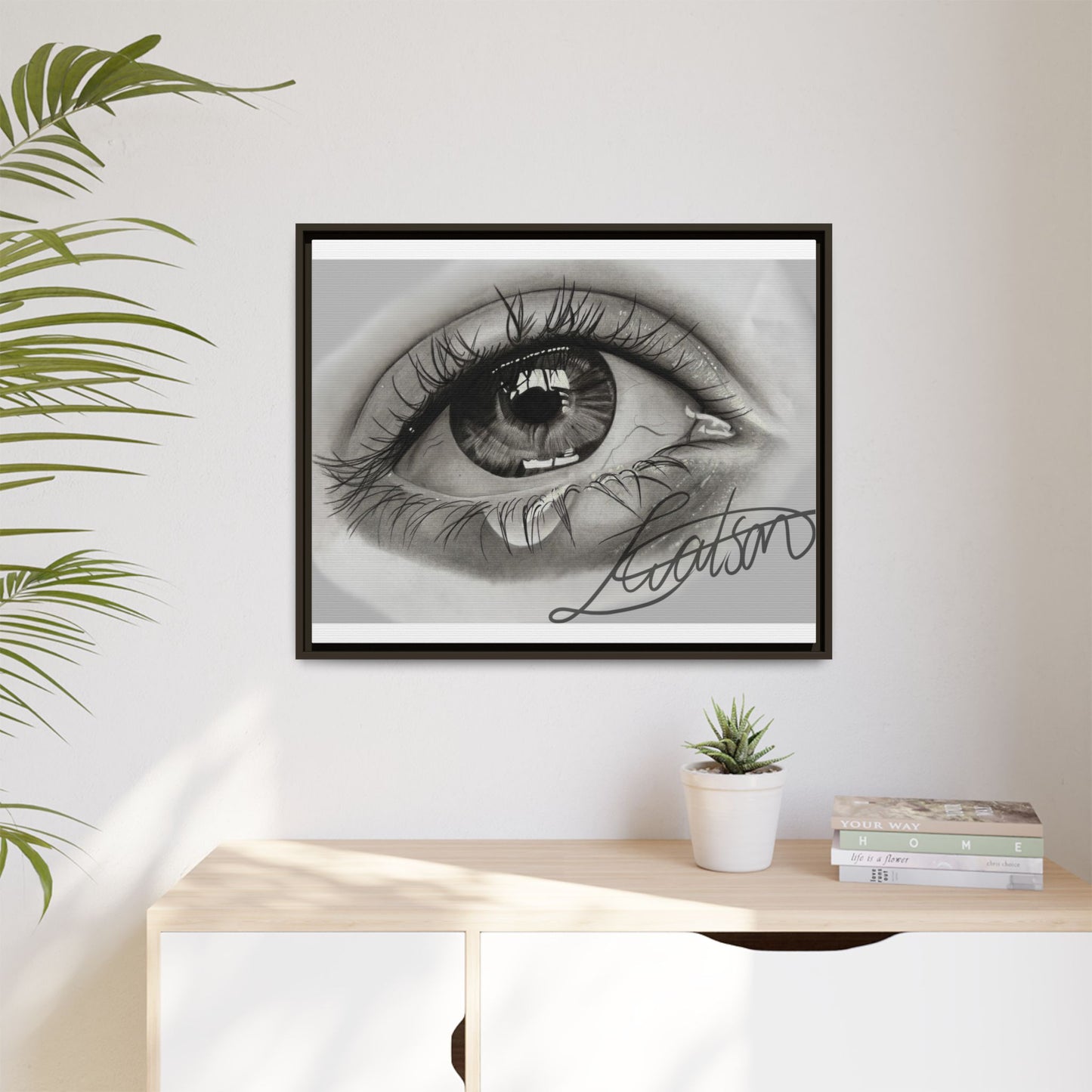 Gerahmte Leinwandkunst – Realistisches Auge mit tränenförmiger Signatur