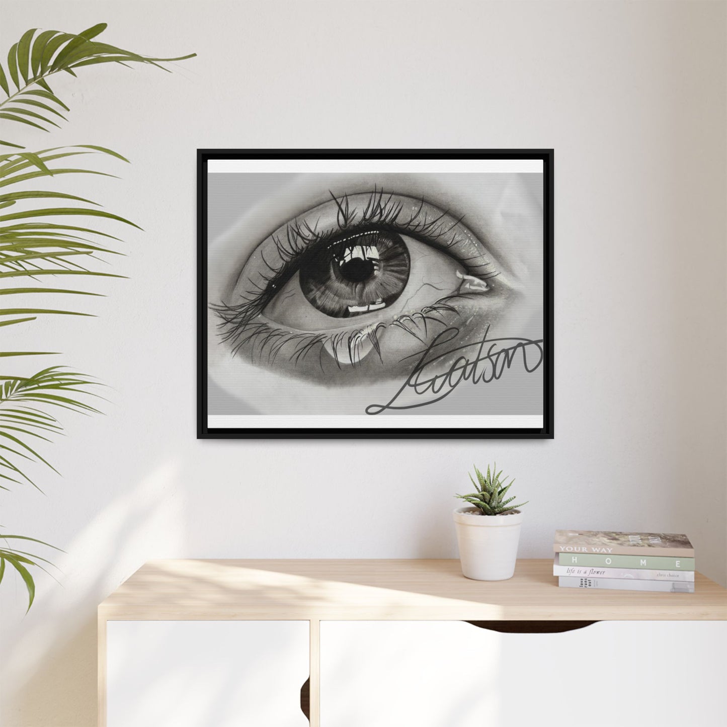 Gerahmte Leinwandkunst – Realistisches Auge mit tränenförmiger Signatur