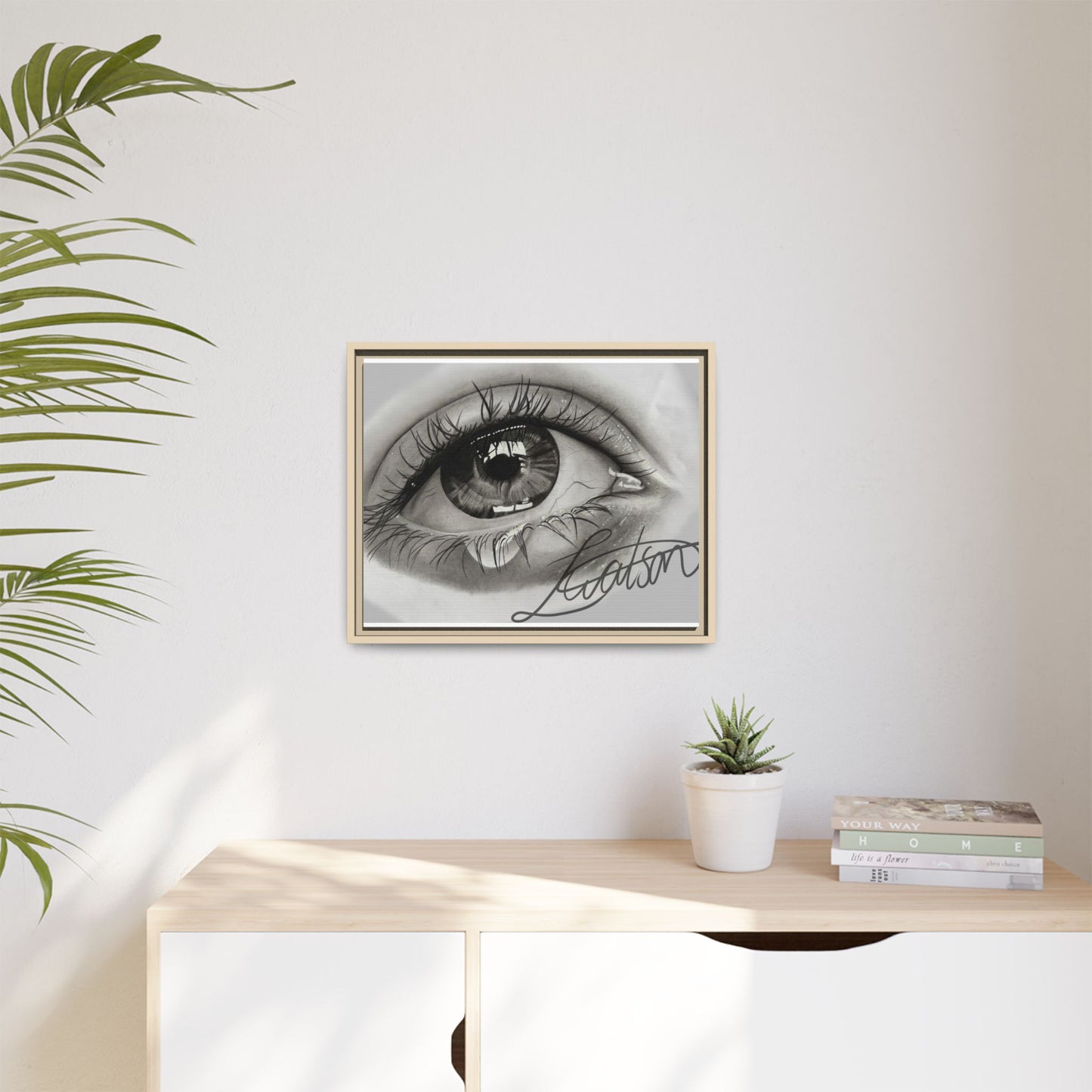 Gerahmte Leinwandkunst – Realistisches Auge mit tränenförmiger Signatur