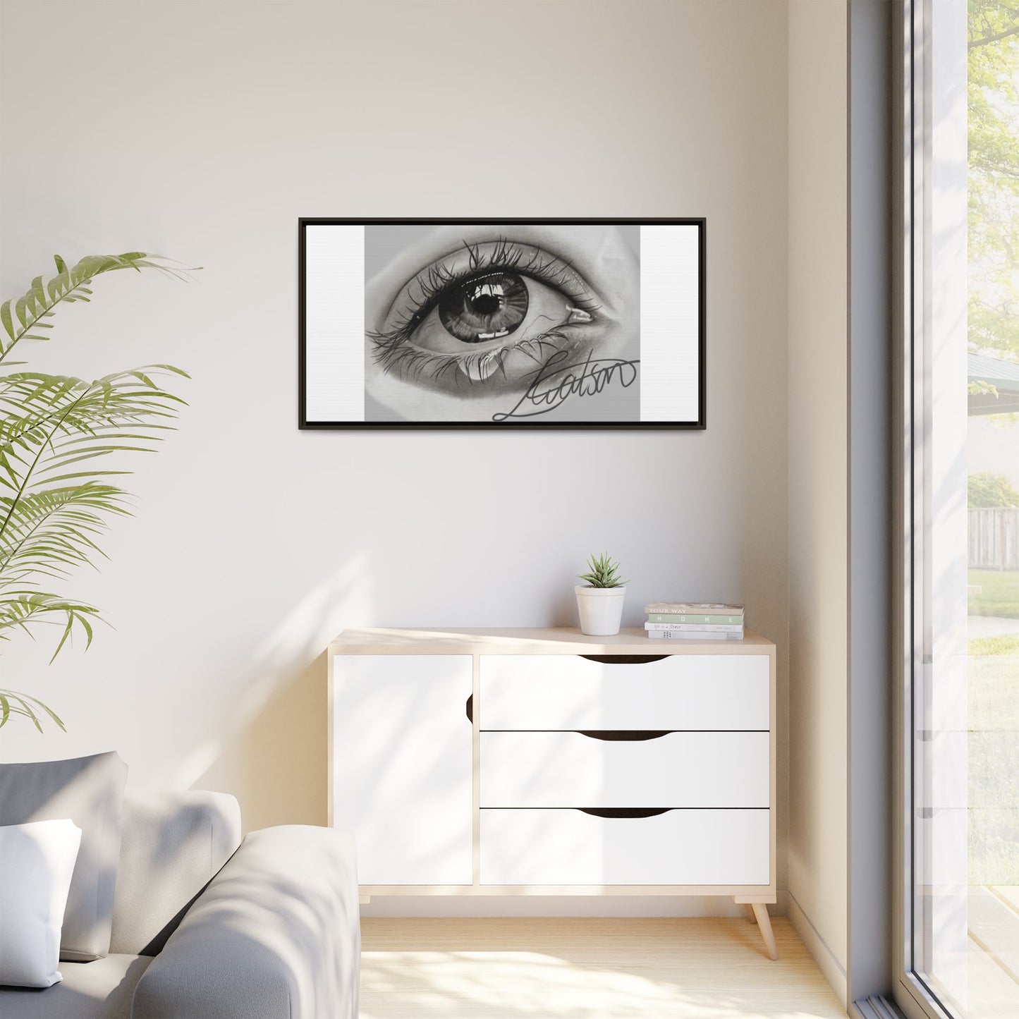 Gerahmte Leinwandkunst – Realistisches Auge mit tränenförmiger Signatur