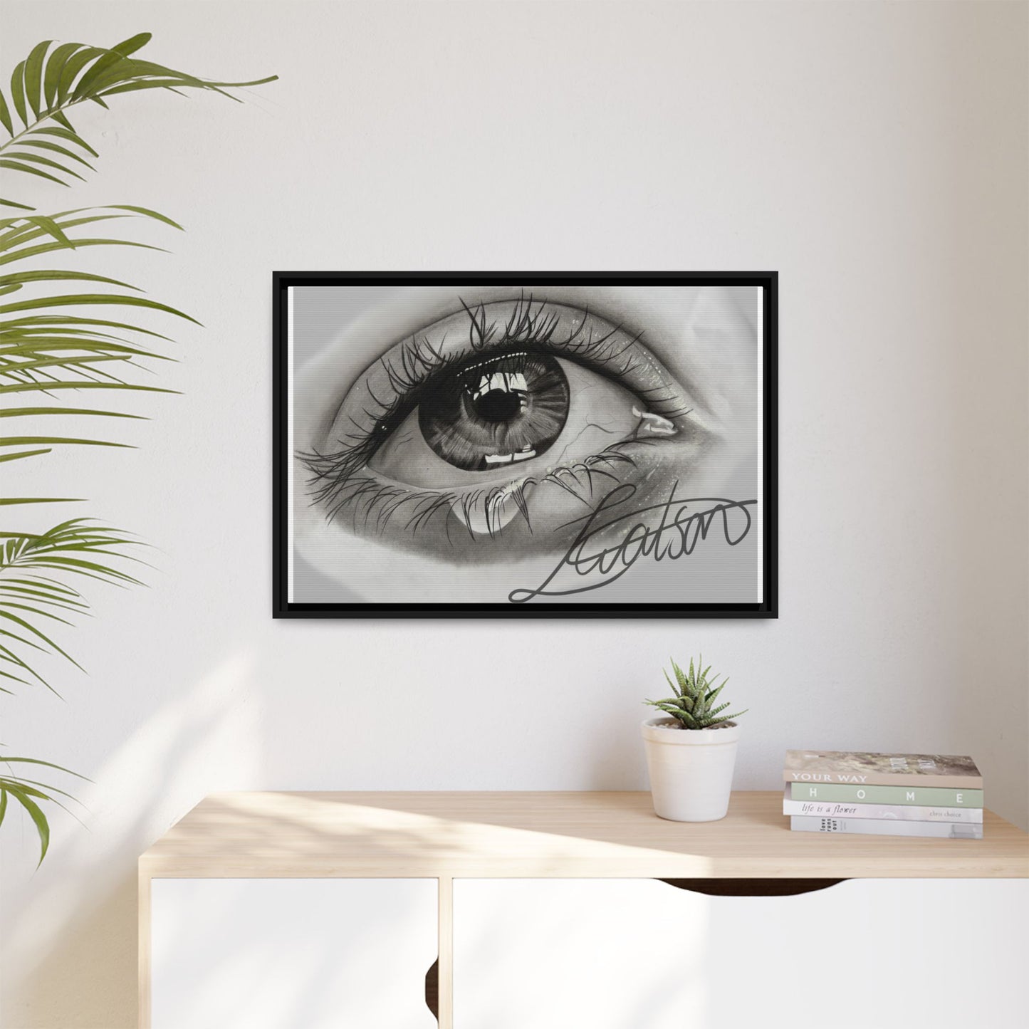 Gerahmte Leinwandkunst – Realistisches Auge mit tränenförmiger Signatur