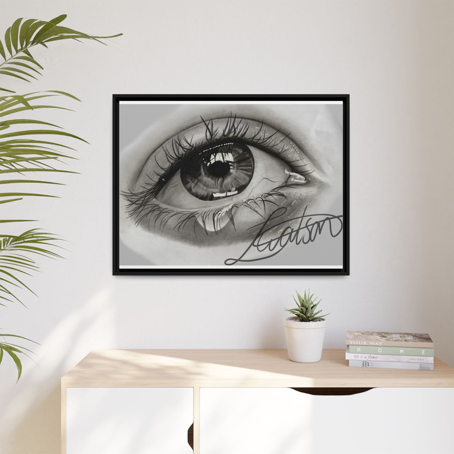 Gerahmte Leinwandkunst – Realistisches Auge mit tränenförmiger Signatur