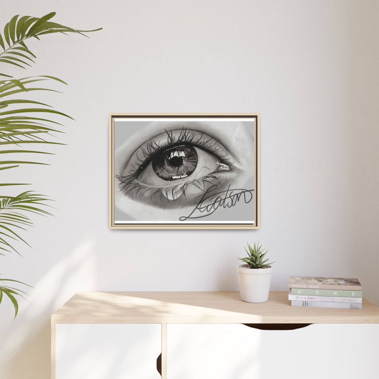 Gerahmte Leinwandkunst – Realistisches Auge mit tränenförmiger Signatur