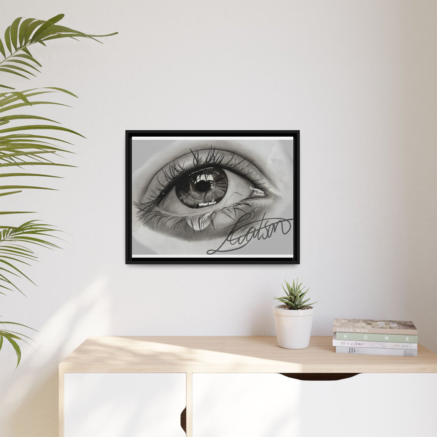 Gerahmte Leinwandkunst – Realistisches Auge mit tränenförmiger Signatur