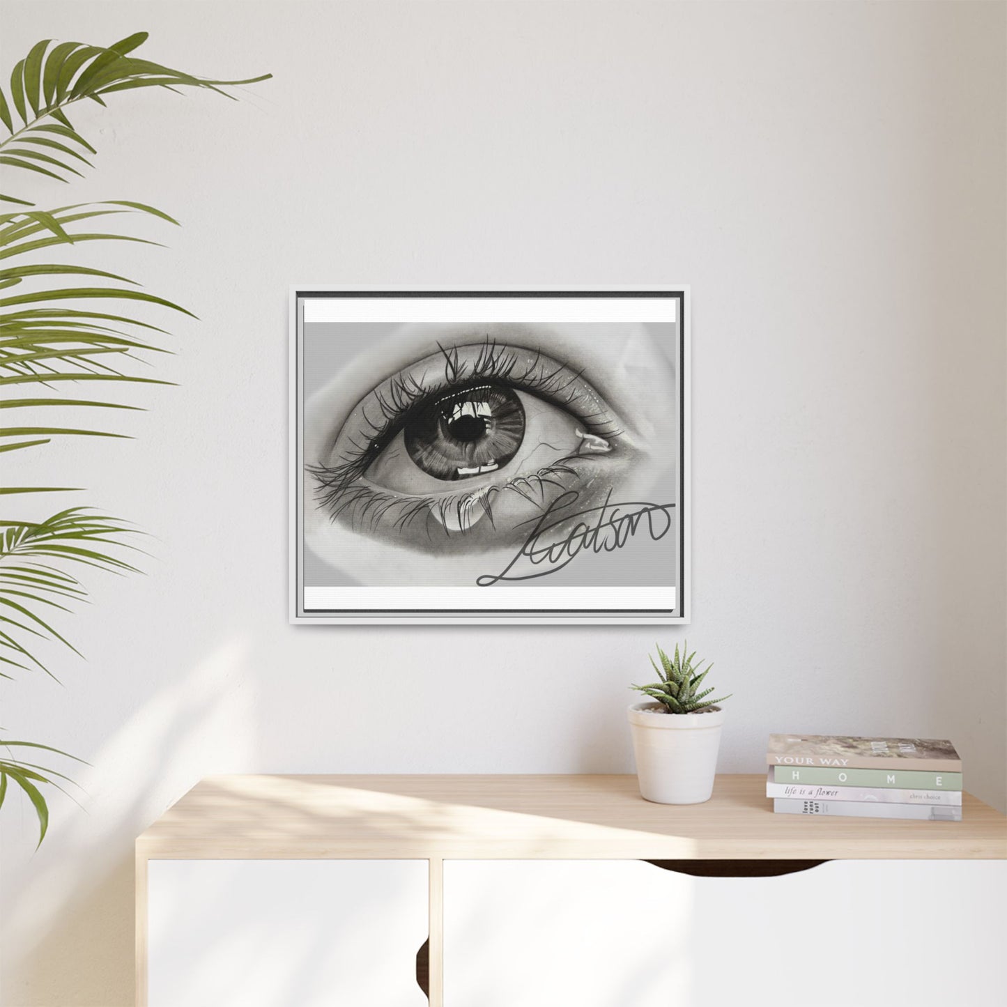 Gerahmte Leinwandkunst – Realistisches Auge mit tränenförmiger Signatur