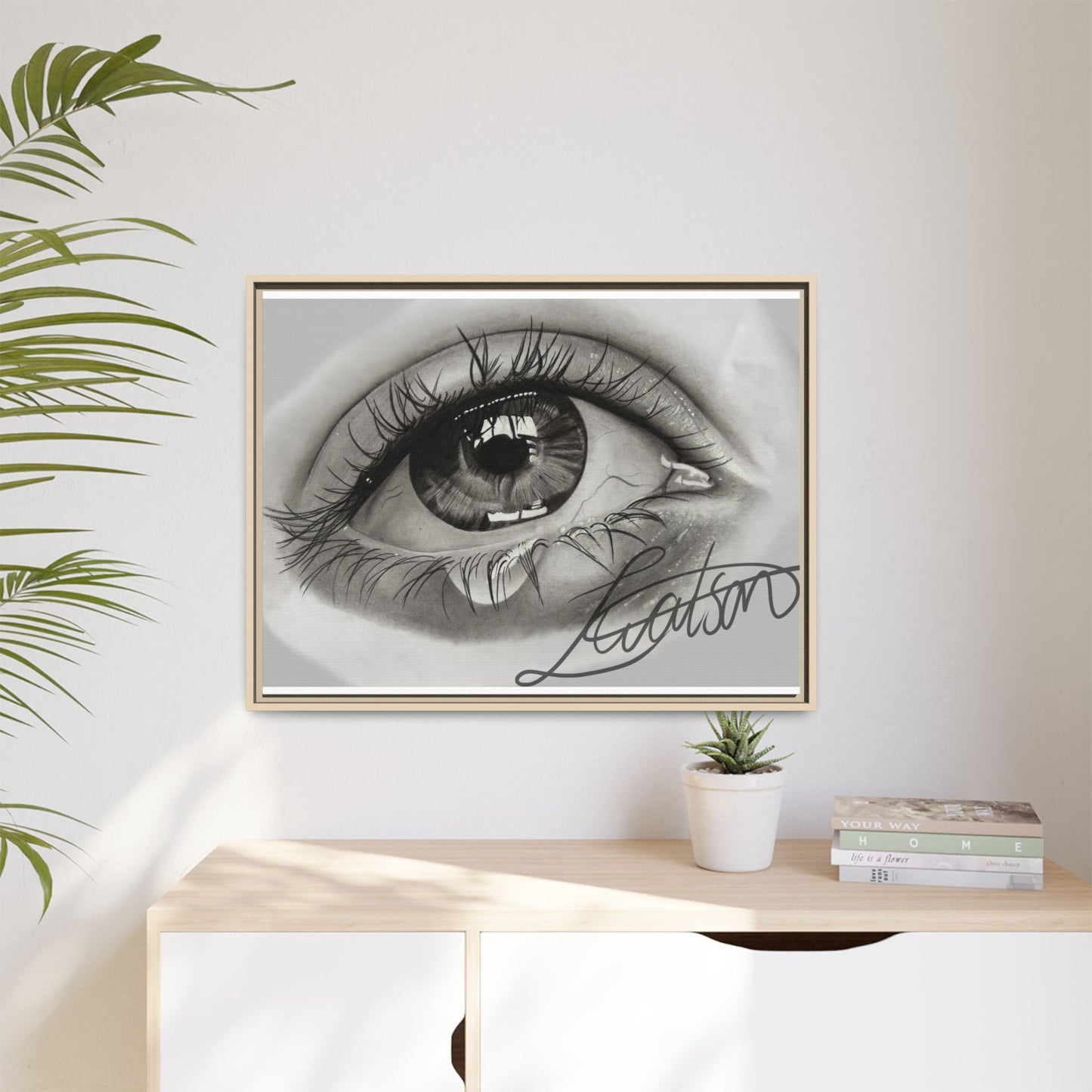 Gerahmte Leinwandkunst – Realistisches Auge mit tränenförmiger Signatur