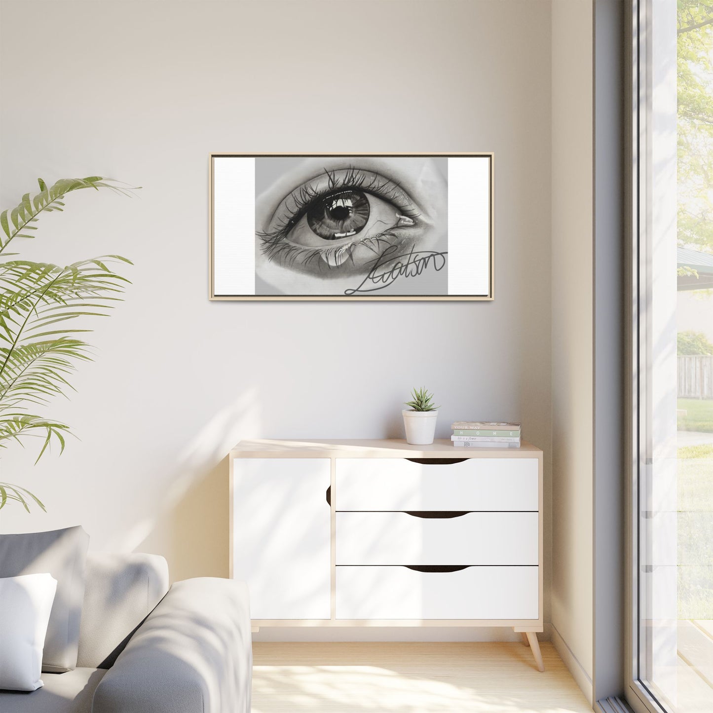 Gerahmte Leinwandkunst – Realistisches Auge mit tränenförmiger Signatur