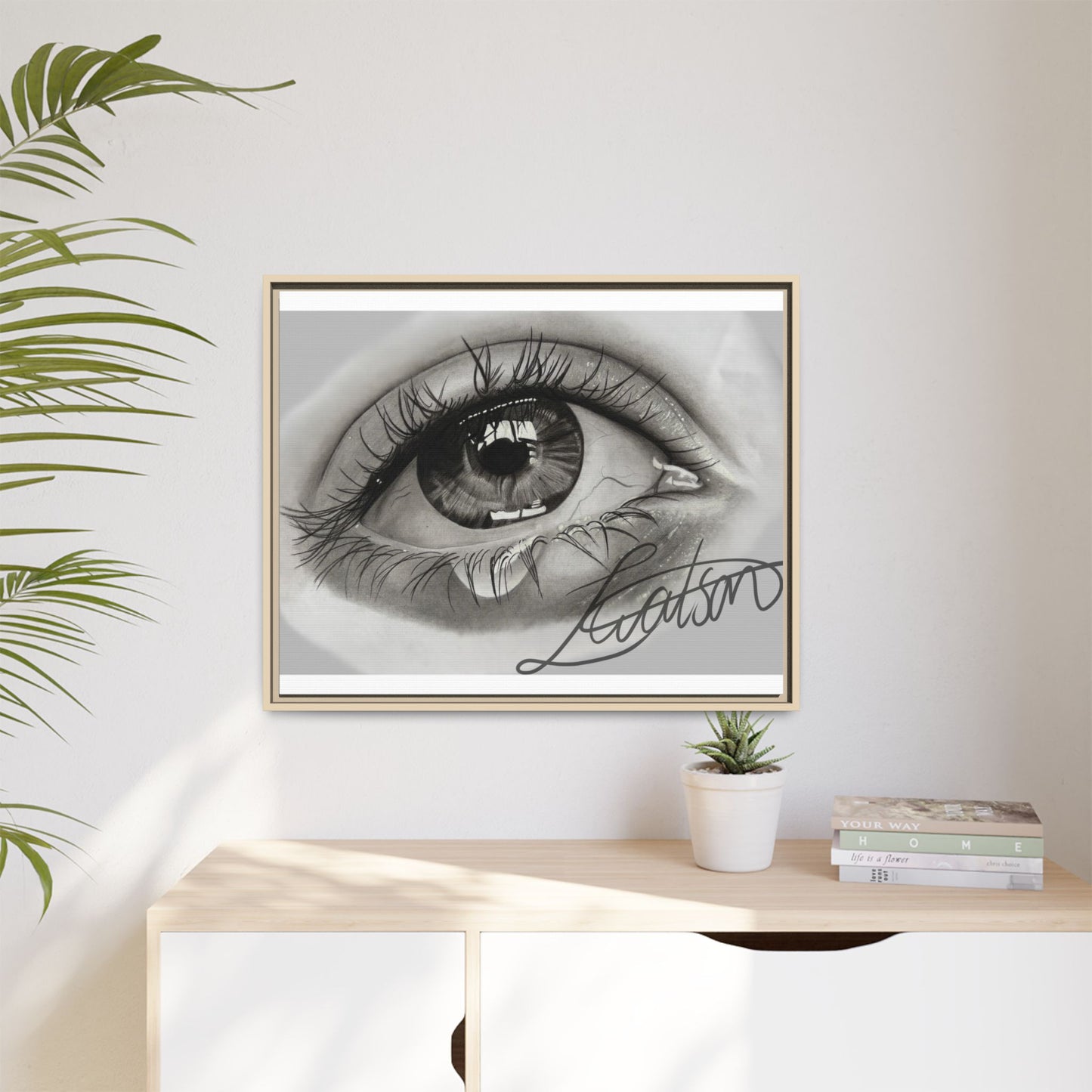 Gerahmte Leinwandkunst – Realistisches Auge mit tränenförmiger Signatur