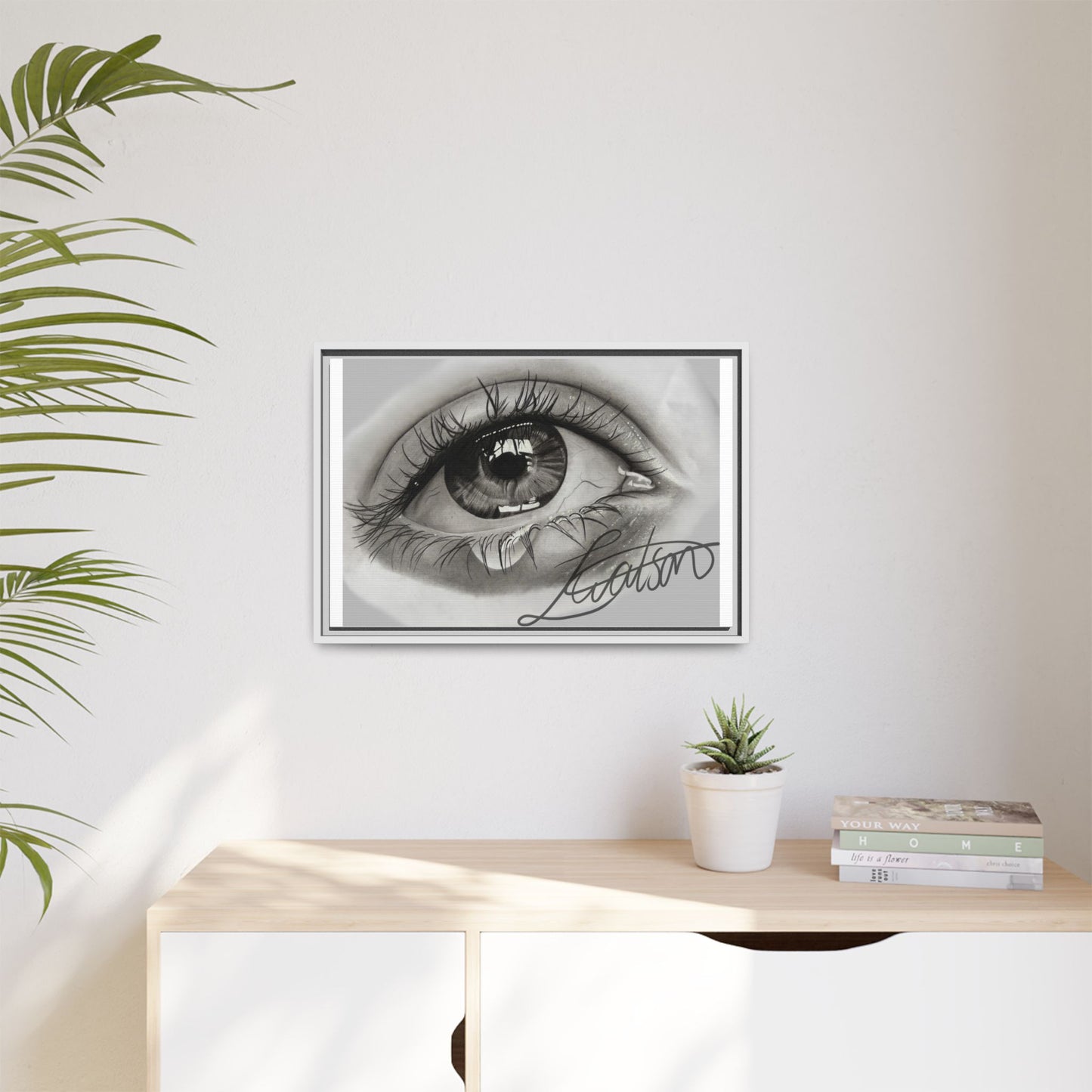 Gerahmte Leinwandkunst – Realistisches Auge mit tränenförmiger Signatur