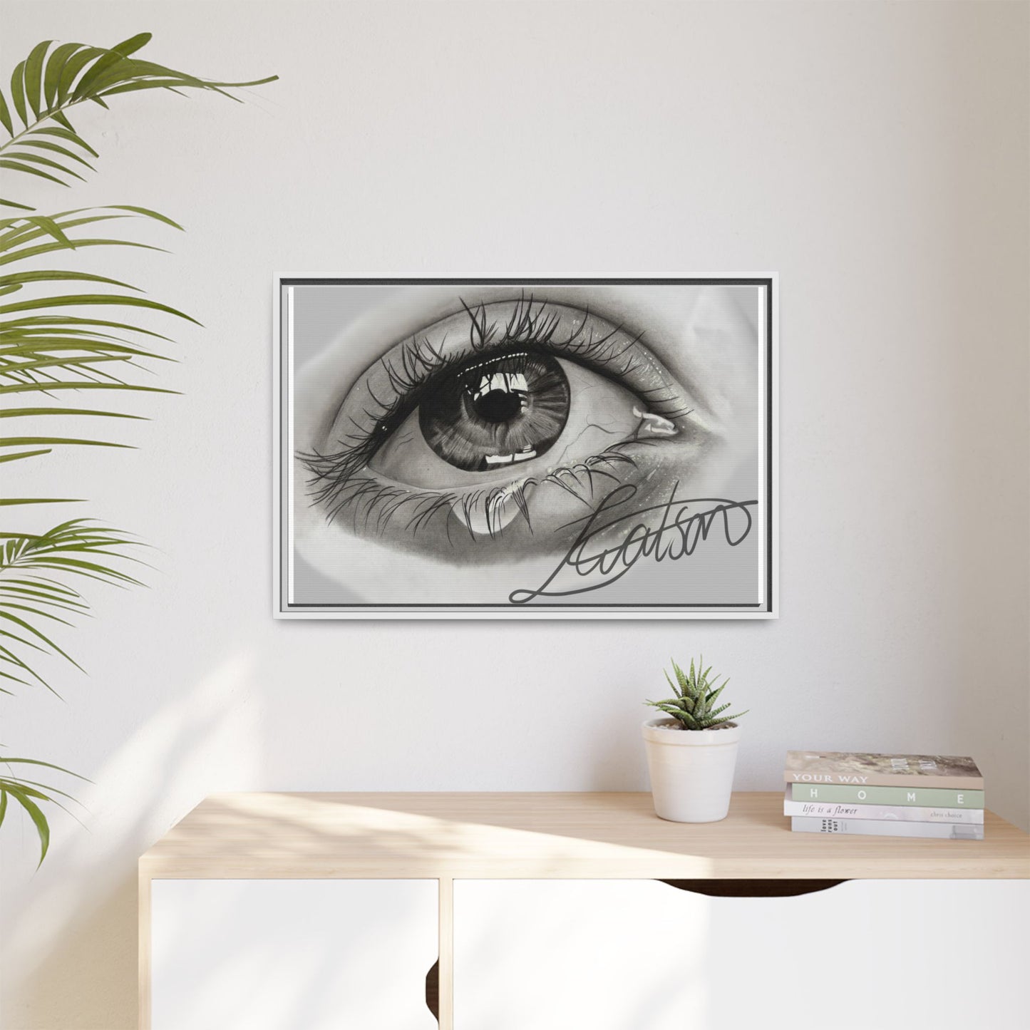 Gerahmte Leinwandkunst – Realistisches Auge mit tränenförmiger Signatur
