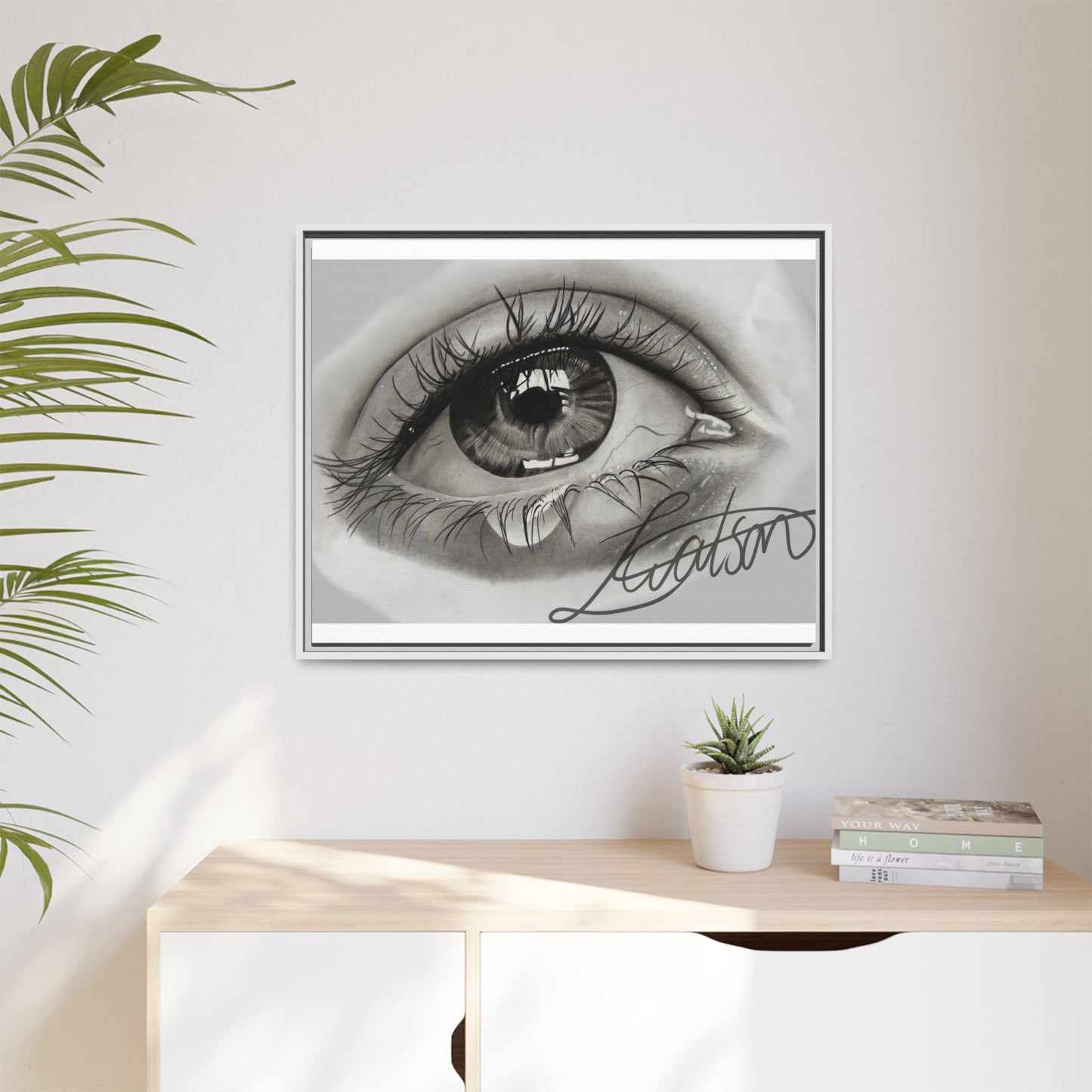 Gerahmte Leinwandkunst – Realistisches Auge mit tränenförmiger Signatur