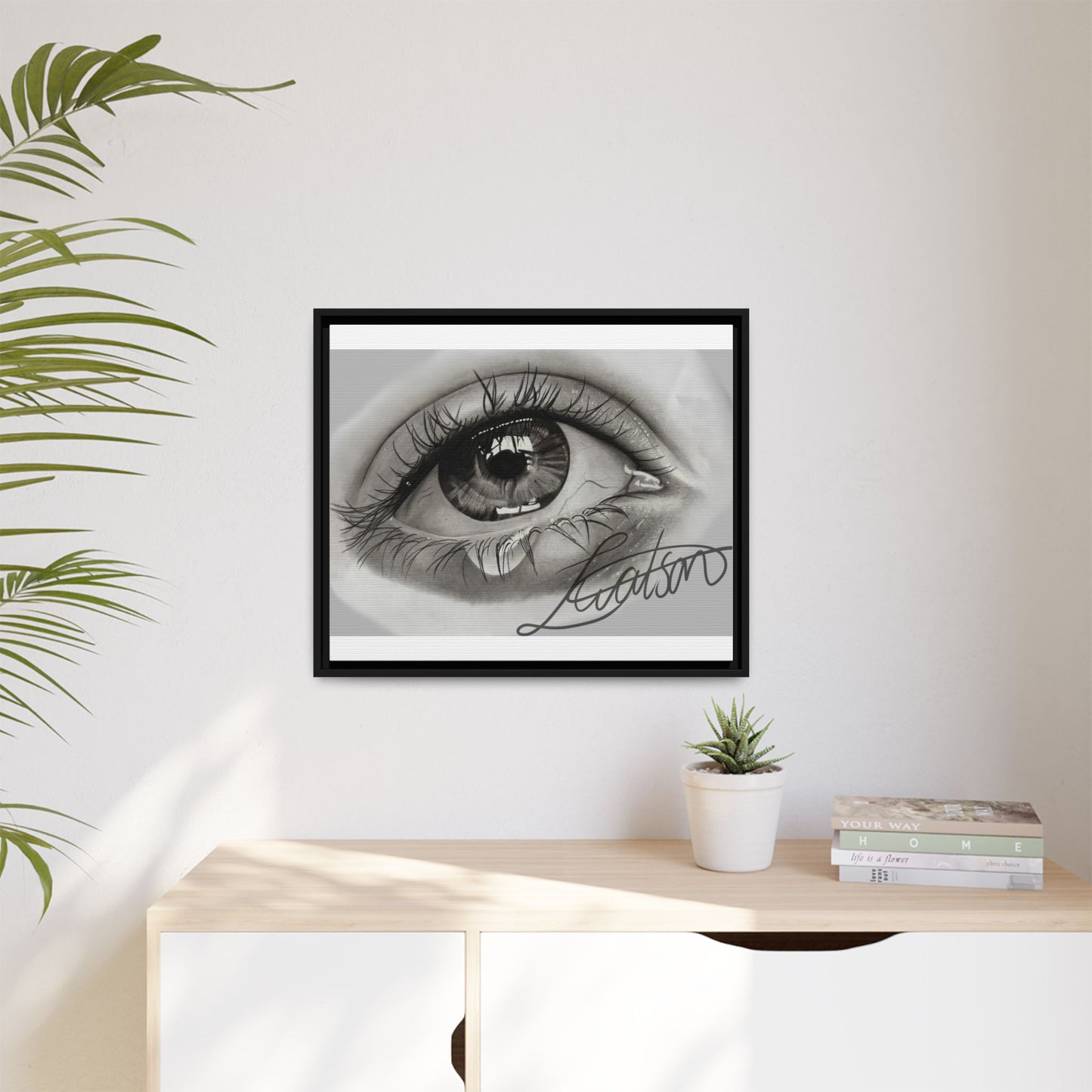 Gerahmte Leinwandkunst – Realistisches Auge mit tränenförmiger Signatur
